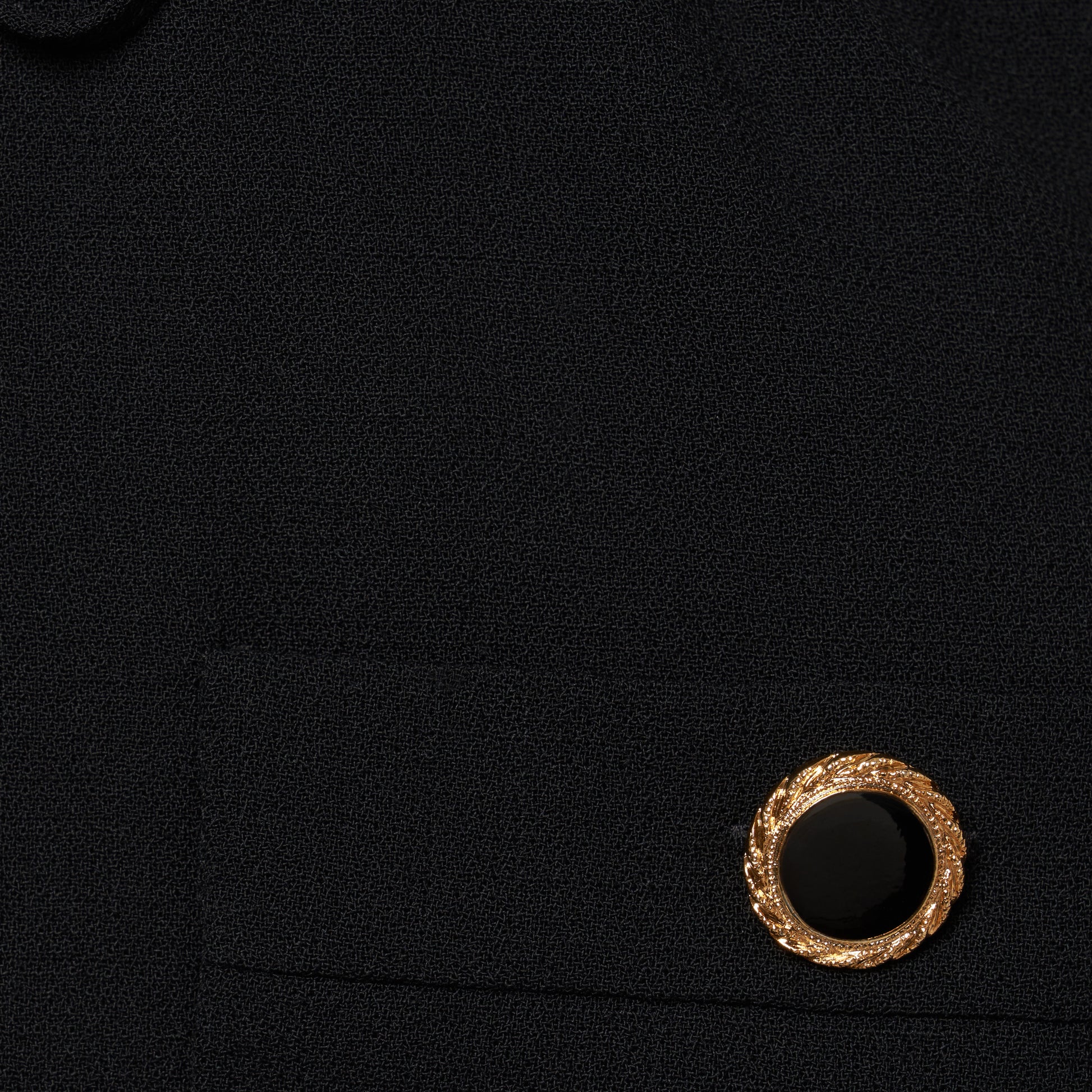 Black light wool crêpe midi dress with a scoop neckline, long sleeves and a drawstring waist. Finished with patch pockets and black and gold-tone buttons.