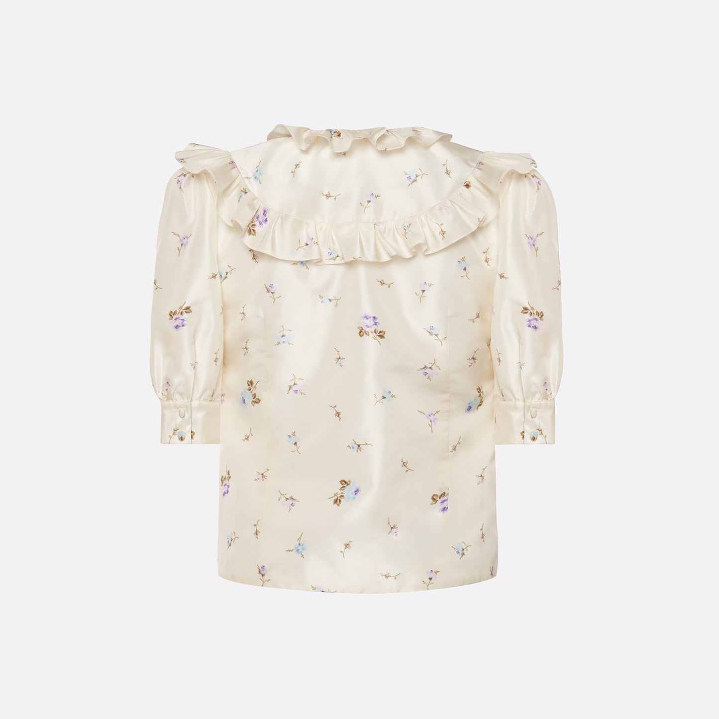Floral-print white silk taffeta blouse with ruffle trims, short puff sleeves and a side button closure.