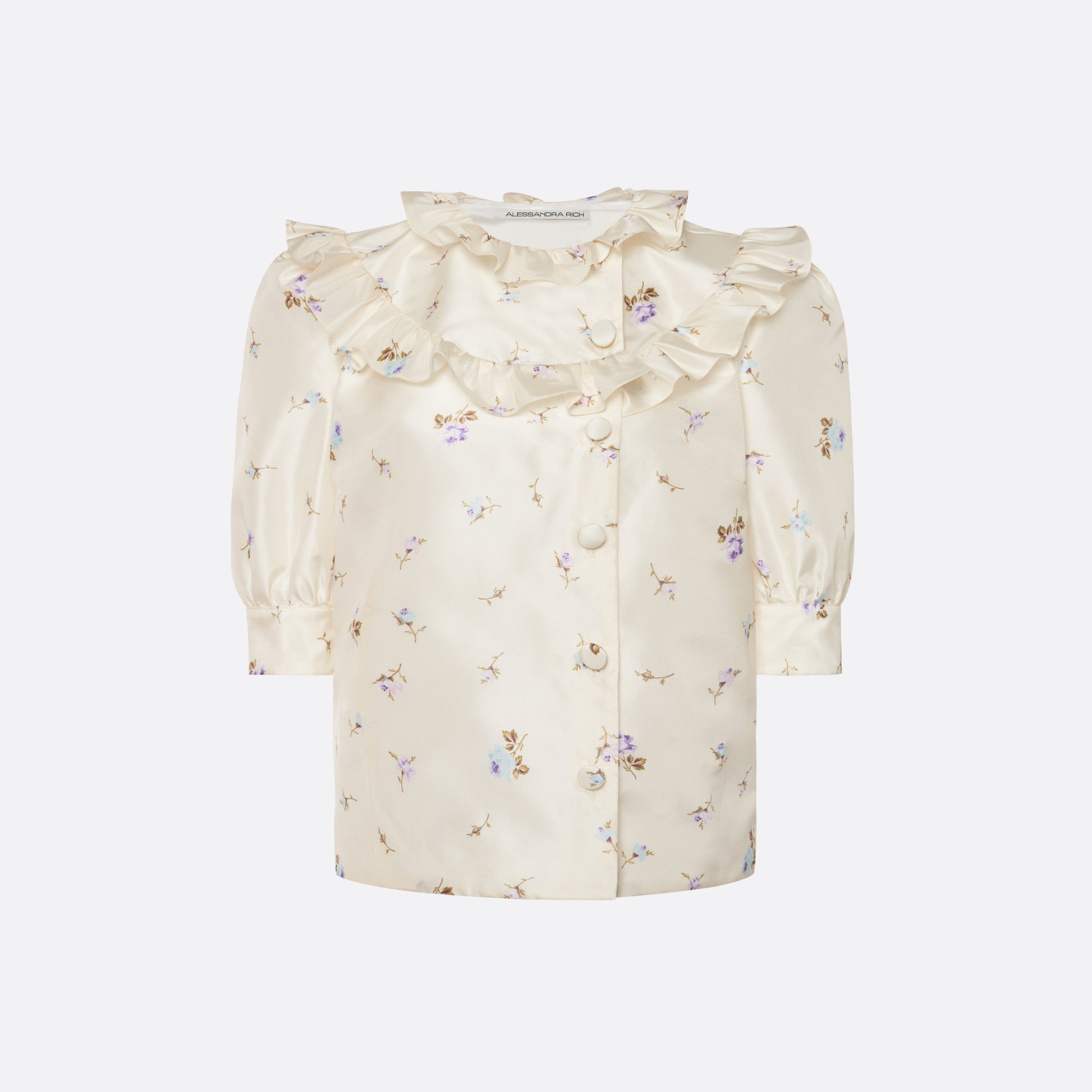 Floral-print white silk taffeta blouse with ruffle trims, short puff sleeves and a side button closure.