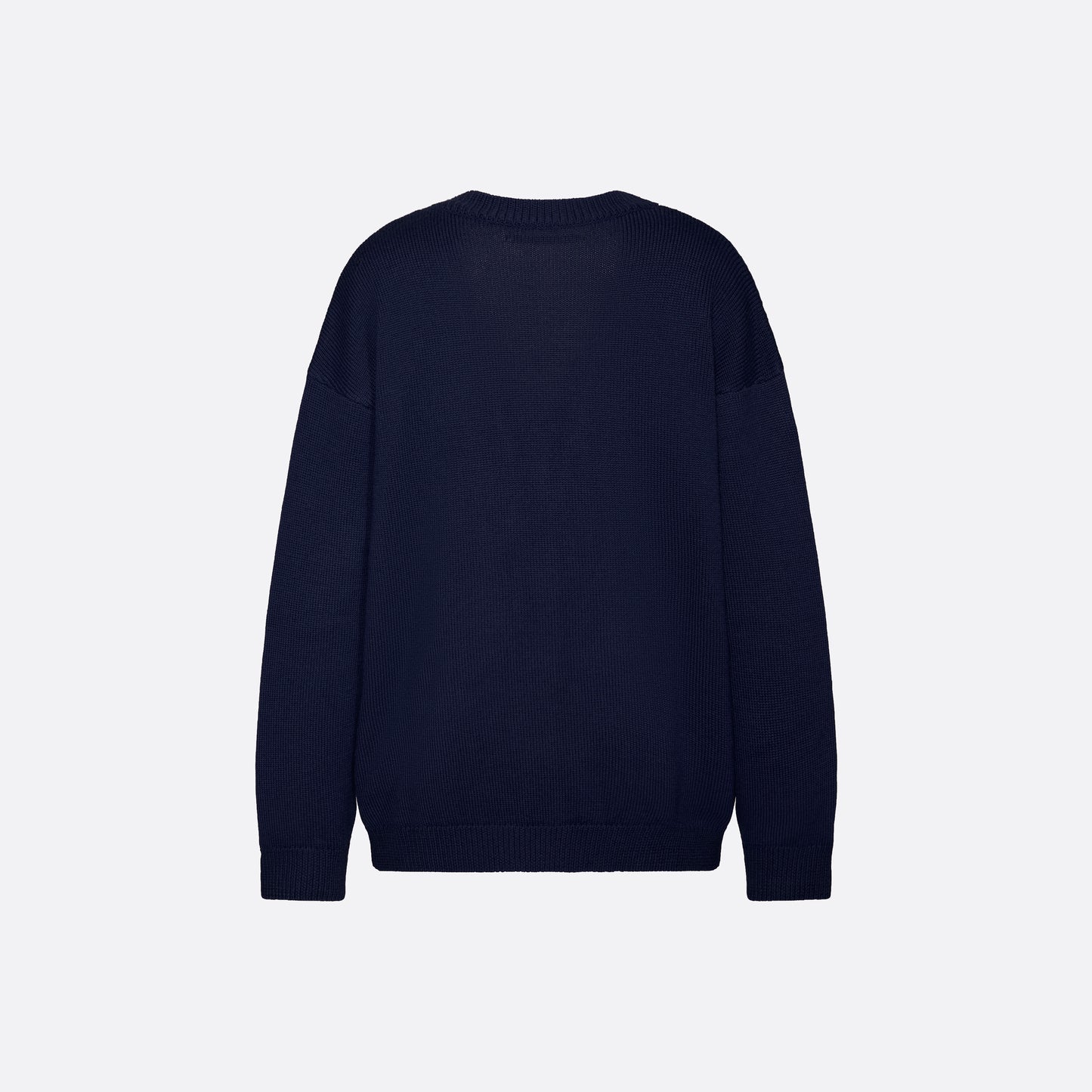 Navy merino wool lace-knit cardigan cut to a relaxed silhouette with a V-neckline. Finished with patch pockets and black and gold-tone buttons.