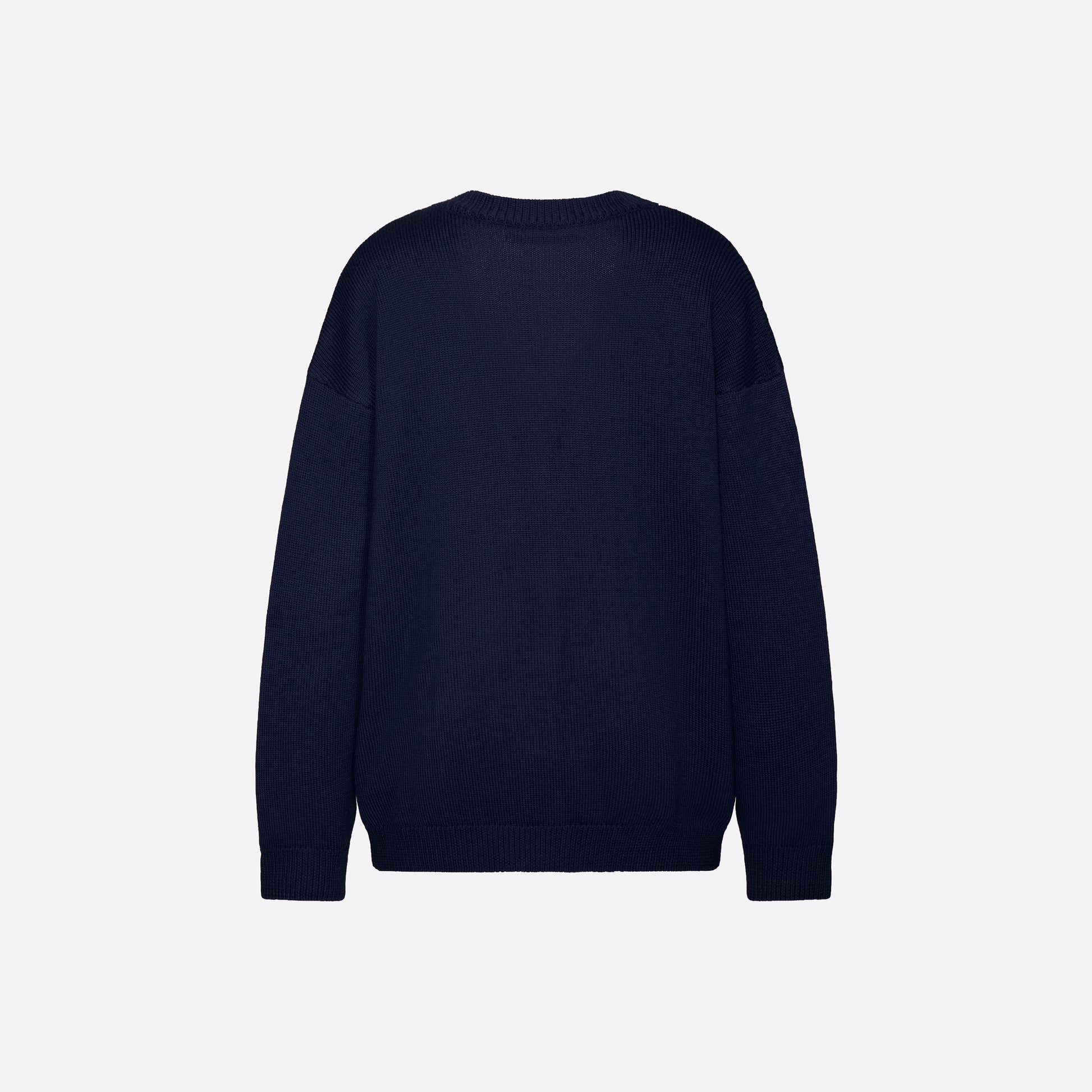 Navy merino wool lace-knit cardigan cut to a relaxed silhouette with a V-neckline. Finished with patch pockets and black and gold-tone buttons.