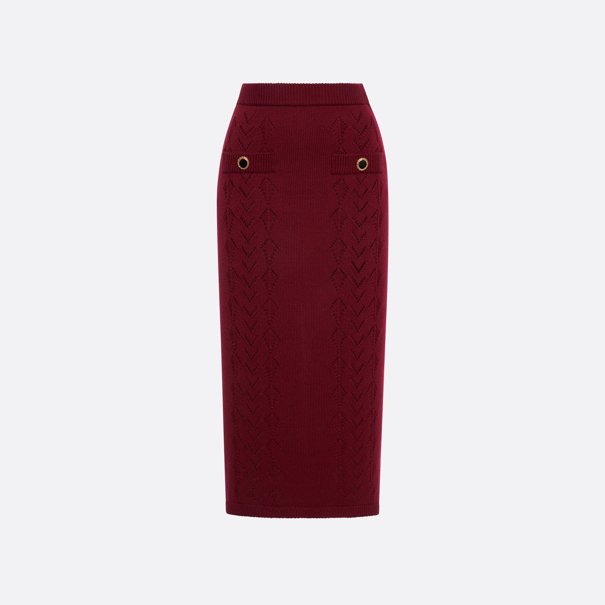 Bordeaux merino wool lace-knit midi skirt cut in a fitted silhouette. Finished with decorative pockets and black and gold-tone buttons.