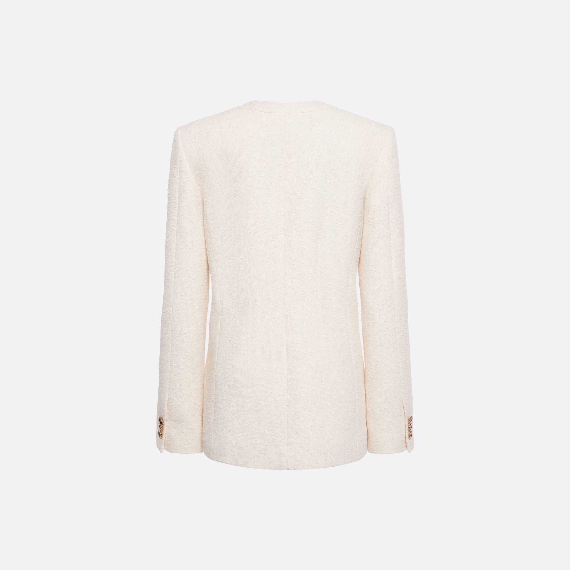 Ivory tweed bouclé jacket cut to a longline silhouette with a V-neckline and patch pockets. Finished with black and gold-tone buttons and a bow detail.