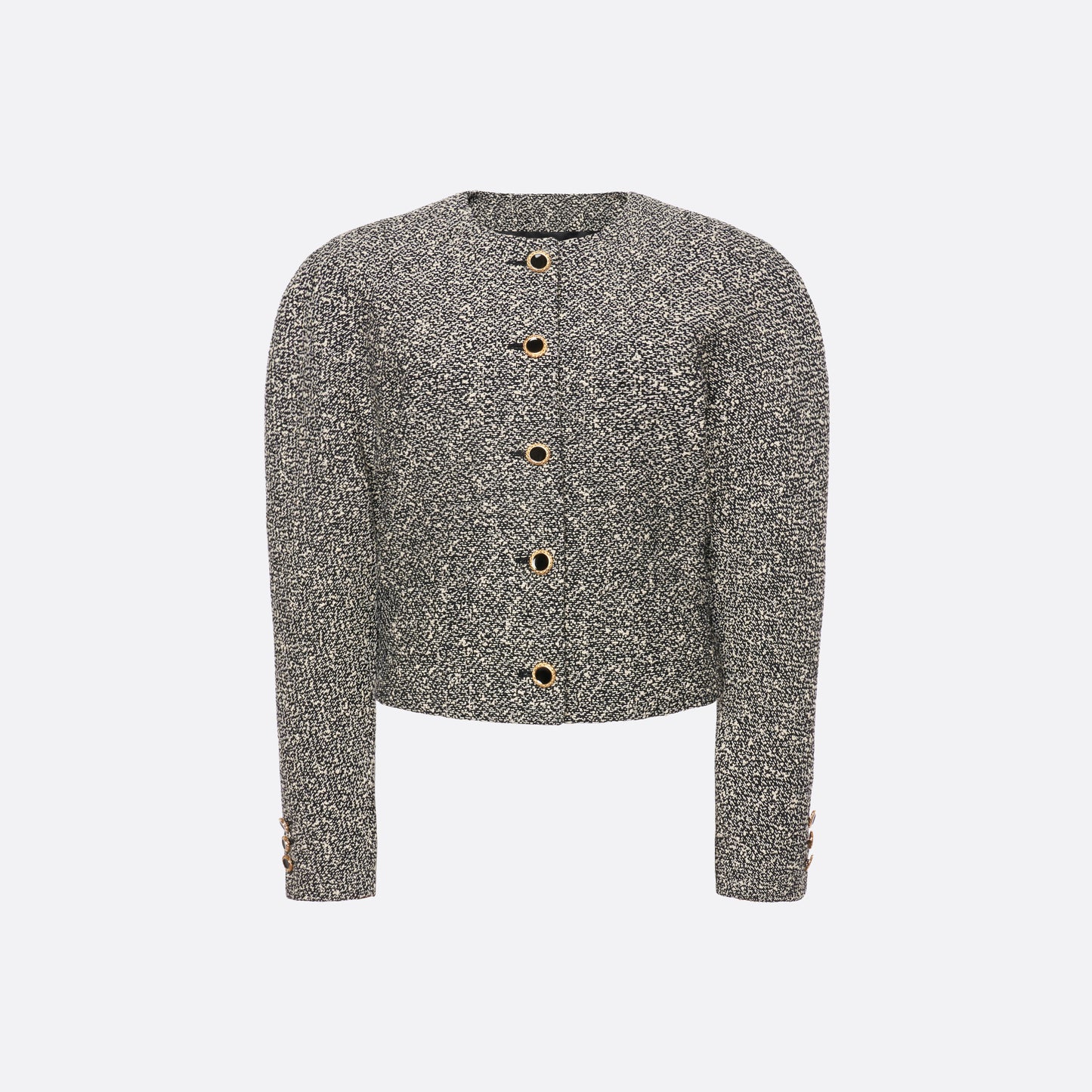 Black and white melange sequin tweed jacket cut in a cropped, boxy silhouette with defined shoulders and finished with black and gold-tone buttons.