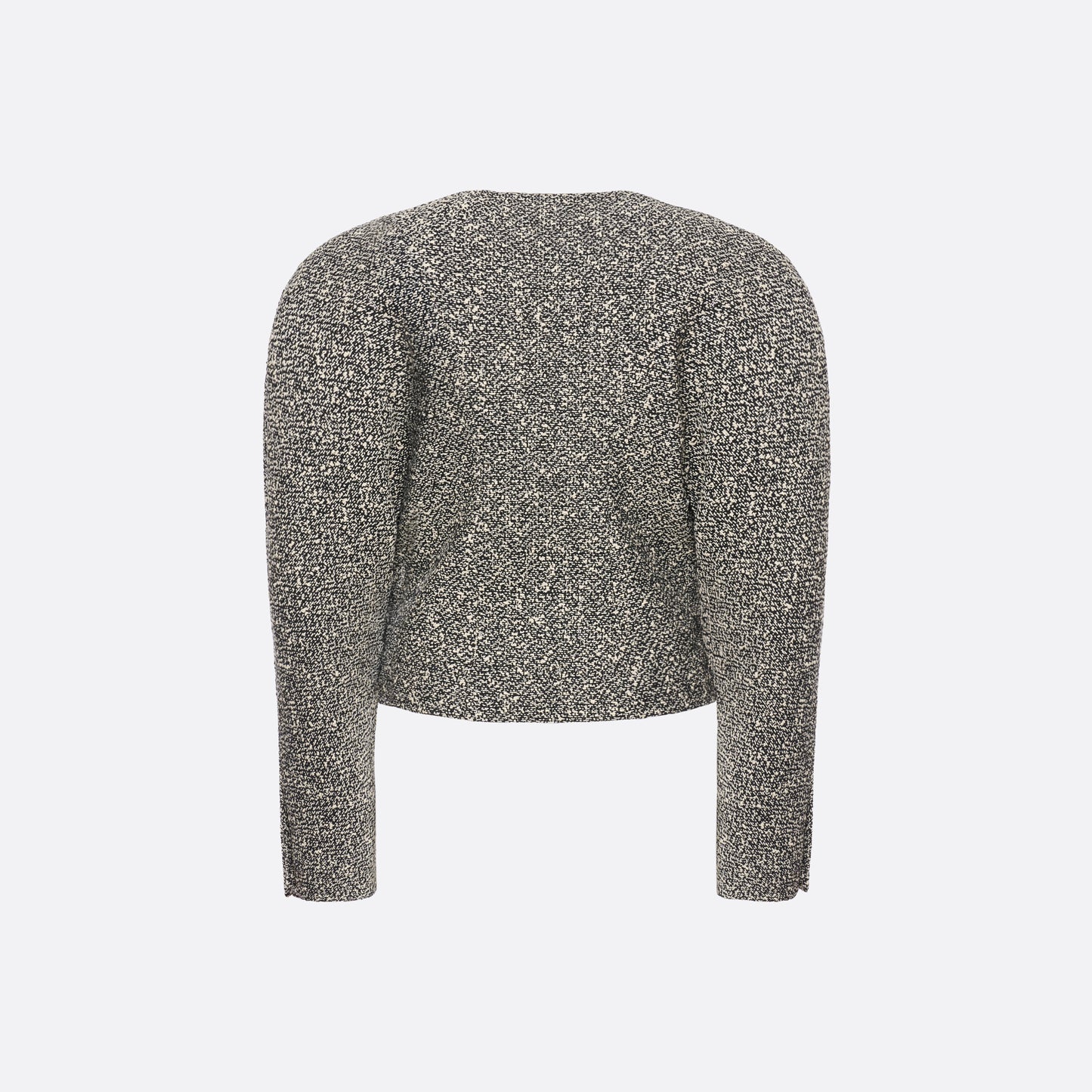 Black and white melange sequin tweed jacket cut in a cropped, boxy silhouette with defined shoulders and finished with black and gold-tone buttons.
