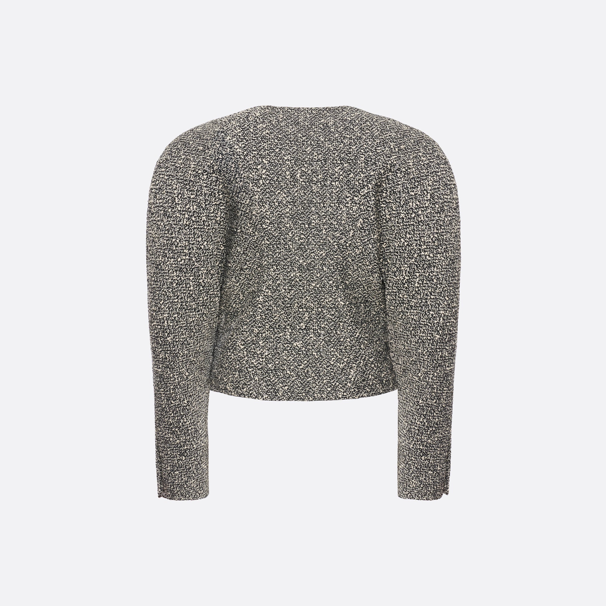 Black and white melange sequin tweed jacket cut in a cropped, boxy silhouette with defined shoulders and finished with black and gold-tone buttons.