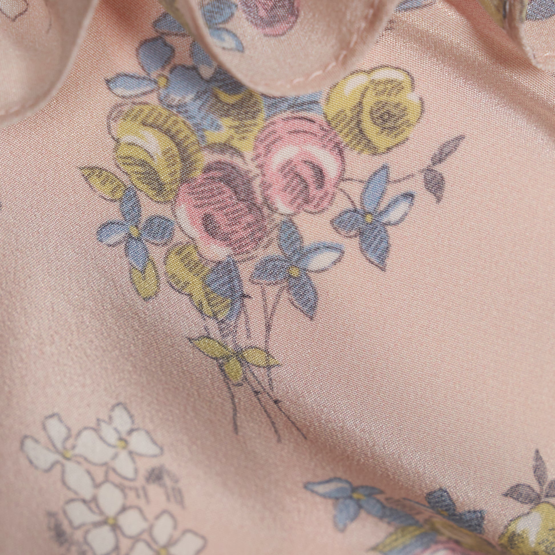 Light rose floral print silk crêpe de chine sleeveless mini dress, featuring ruched detailing and ruffled trims.