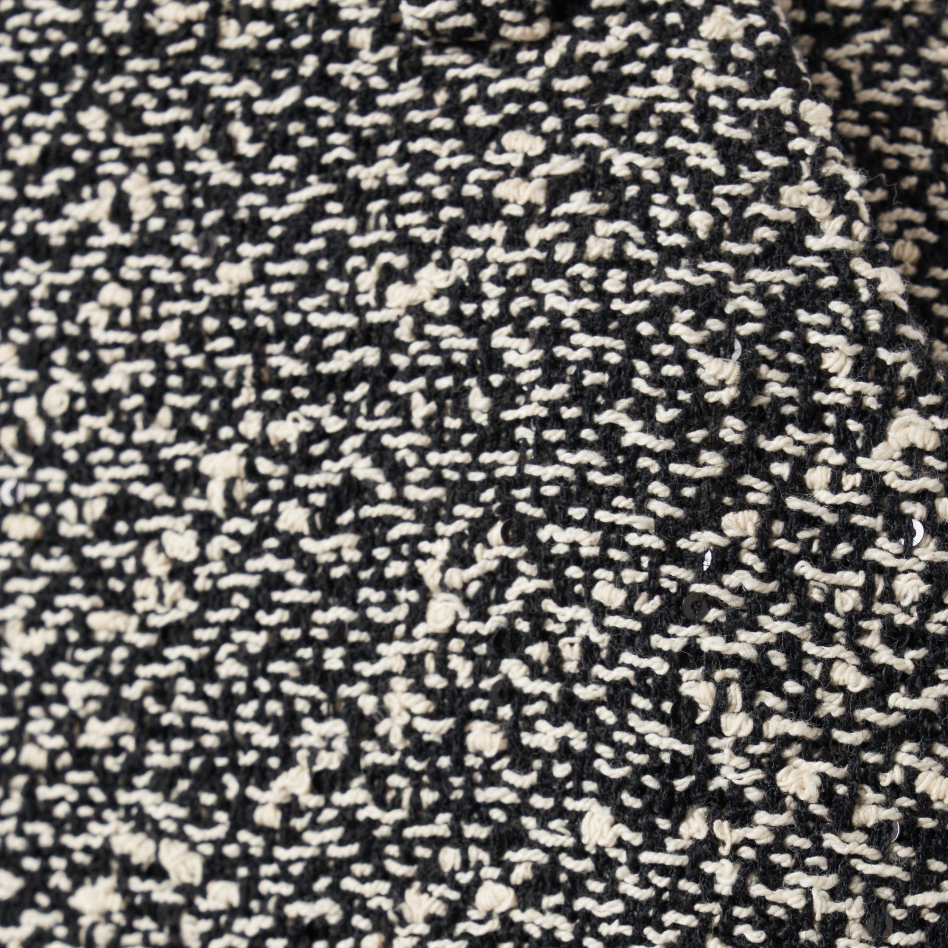 Black and white melange sequin tweed pencil skirt with a back split.