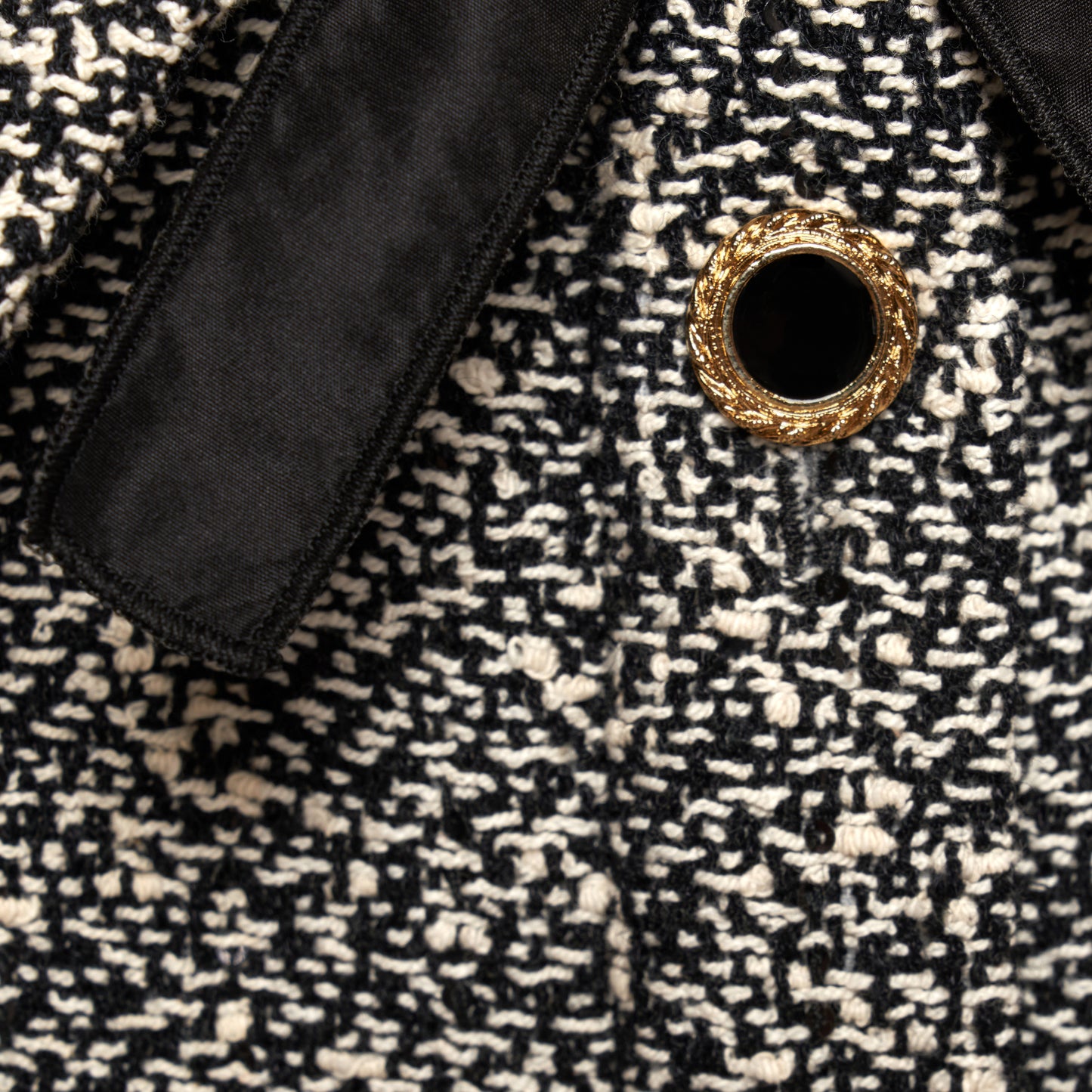 Black and white melange sequins tweed midi dress cut to a fitted silhouette with black and gold-tone buttons and a slim belt.

Look 12 – Fall Winter 2026 Lookbook.
