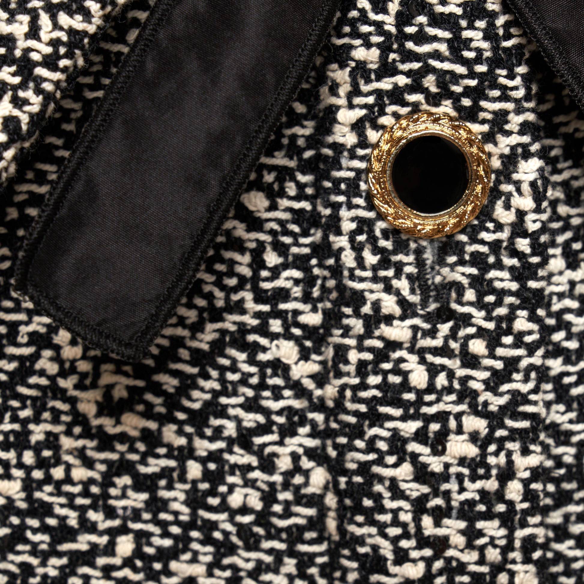 Black and white melange sequins tweed midi dress cut to a fitted silhouette with black and gold-tone buttons and a slim belt.

Look 12 – Fall Winter 2026 Lookbook.