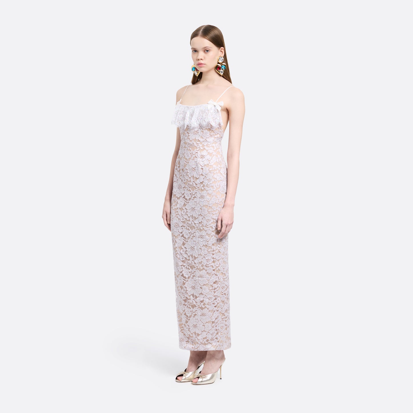 Lavender lace slip dress cut to a fitted silhouette with spaghetti straps and a straight neckline framed by a sequin-embroidered lace volant.