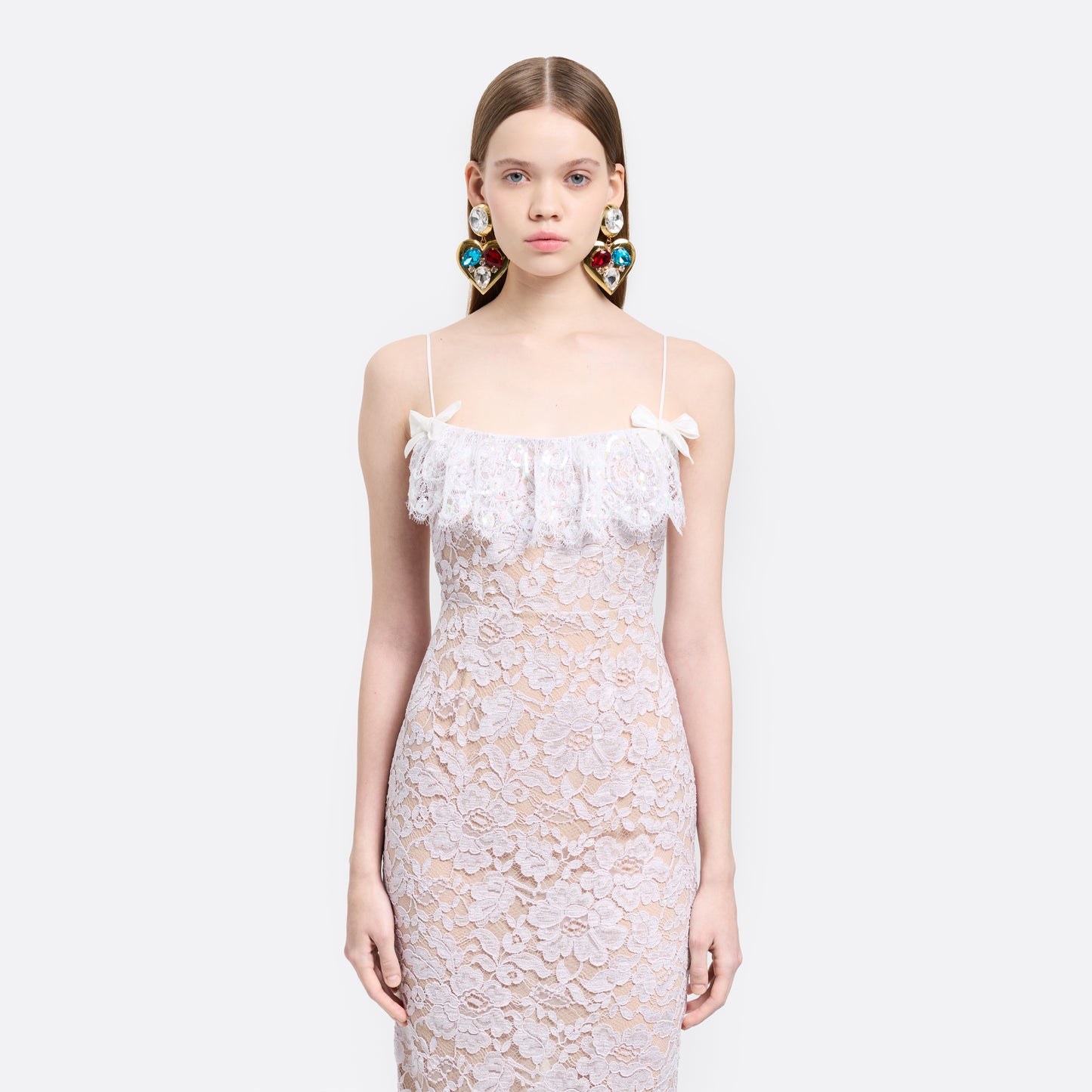 Lavender lace slip dress cut to a fitted silhouette with spaghetti straps and a straight neckline framed by a sequin-embroidered lace volant.