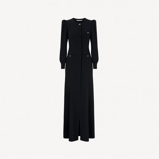 Black silk crêpe de chine evening dress with high side splits and puffed long sleeves, featuring pockets and jewel buttons.

Look 9 – Spring Summer 2027 Lookbook