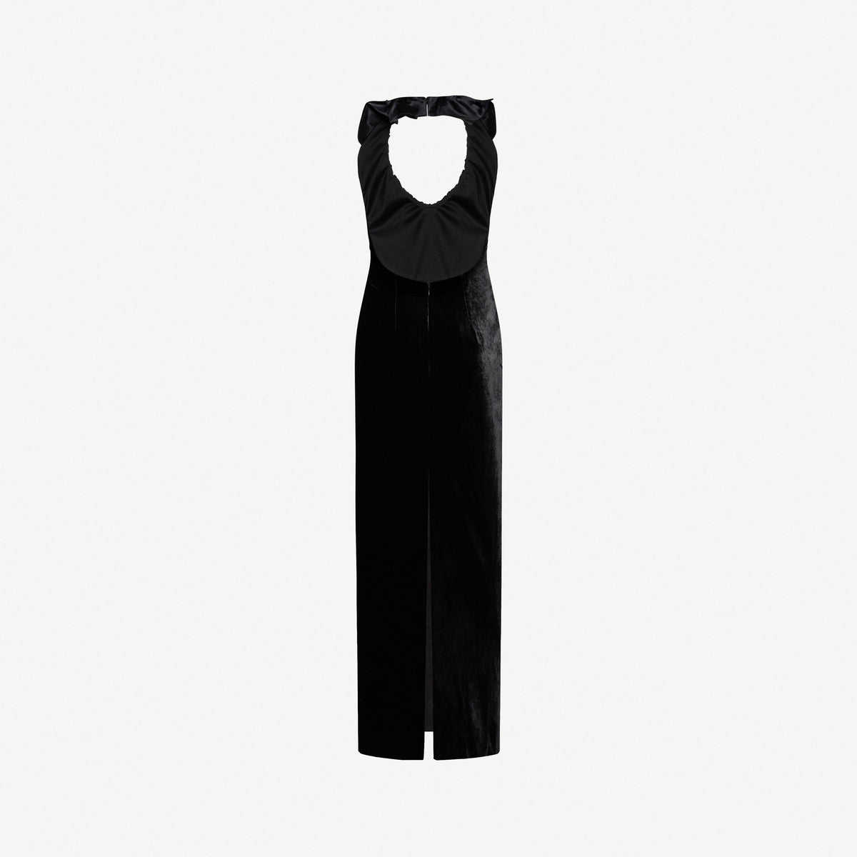 Black velvet evening dress featuring an open back and a deep neckline with a silk ruffle trim.