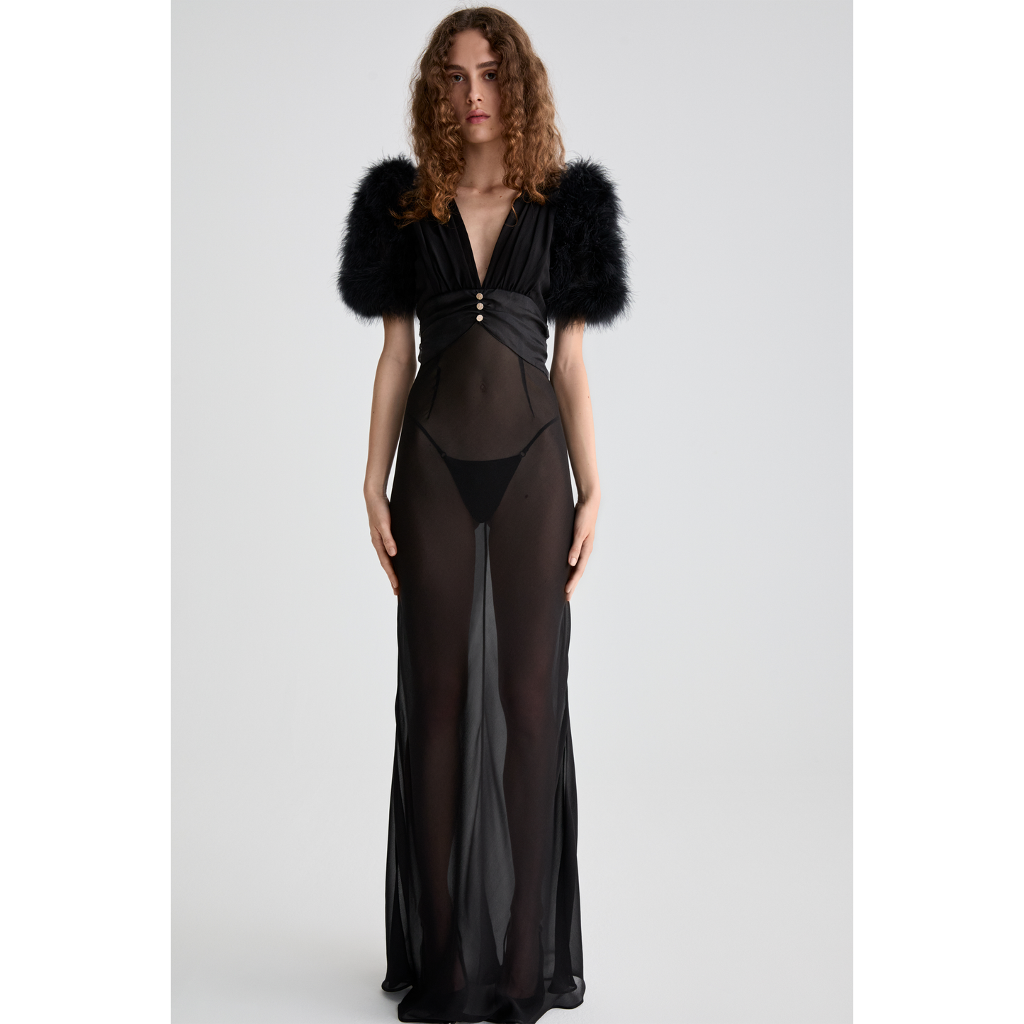 Black silk georgette slip evening dress with a deep v-neckline and short sleeves, featuring feather-trimmed shoulders.

Look 15 – Spring Summer 26 Lookbook