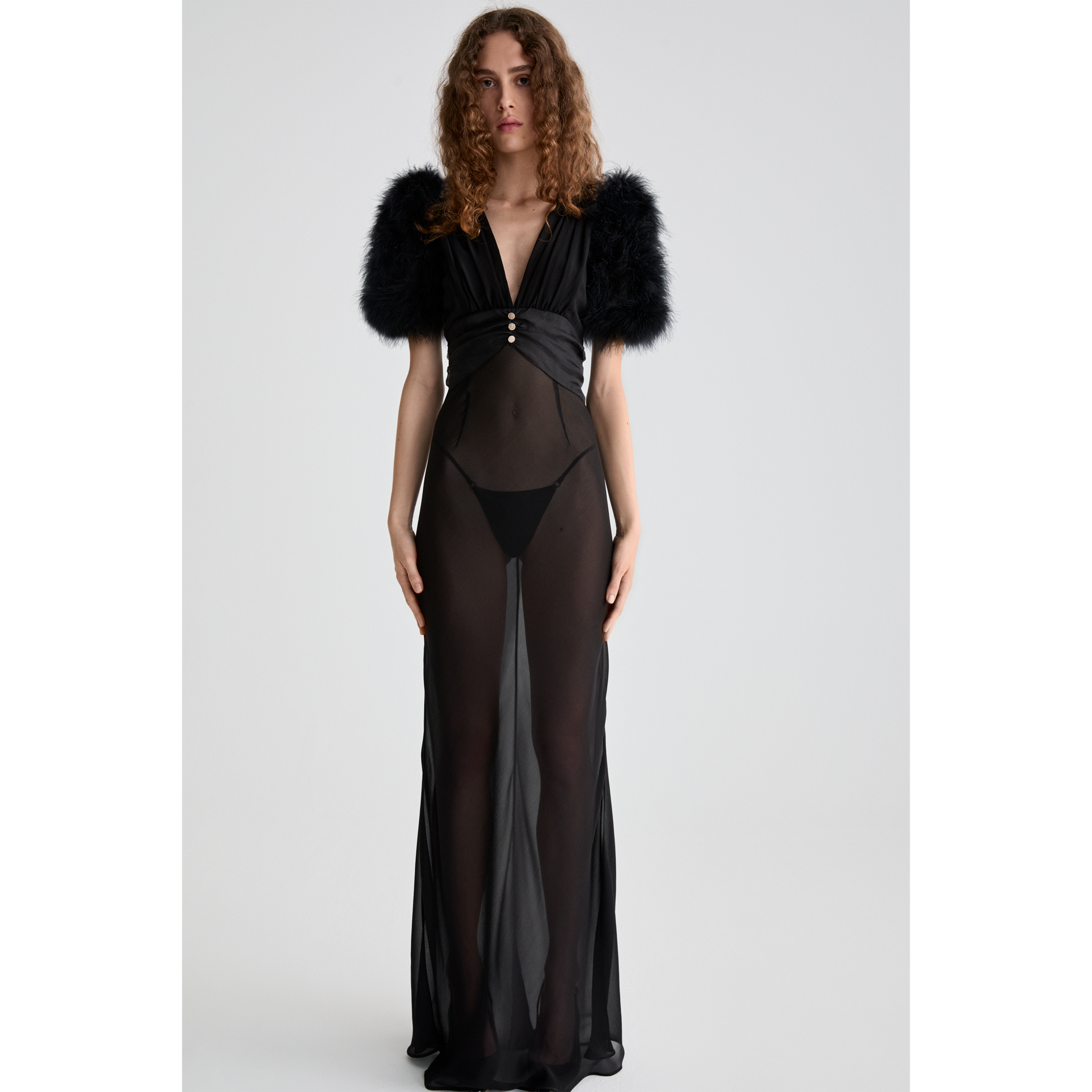 Black silk georgette slip evening dress with a deep v-neckline and short sleeves, featuring feather-trimmed shoulders.

Look 15 – Spring Summer 26 Lookbook